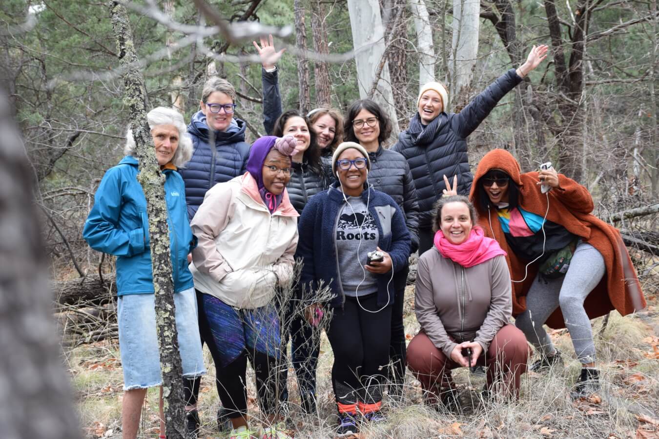 women smiling and laughing in the wookd