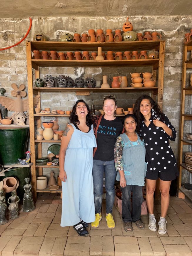 women-inspired four women standing in front of a shelf with ceramic